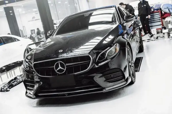 mercedes-benz-e-class-e43-w213-future-design-style-carbon-fibre-front-lip-XXIITUNING_9c2fbc93-c447-4261-95d2-b816d758.webp