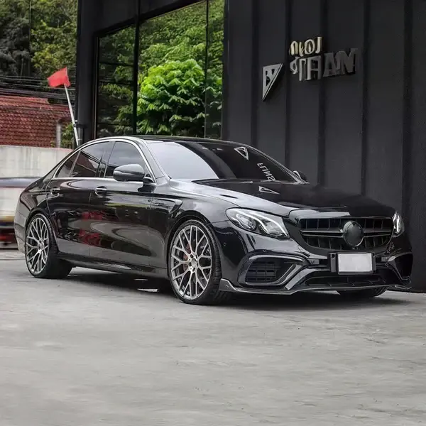 mercedes-benz-e63s-w213-brabus-800-style-carbon-fibre-front-fog-trims-XXIITUNING.webp