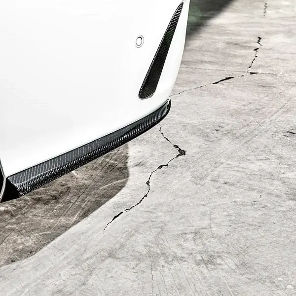 Mercedes-W205-Saloon-Carbon-Fibre-Rear-Bumper-Corner-Canards-XXIITUNING_f7d4722c-431f-49ed-ba50-fa1f1d109860.webp